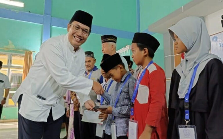 SBI Santuni Yatim Piatu dan Bagikan 3.666 Paket Beras