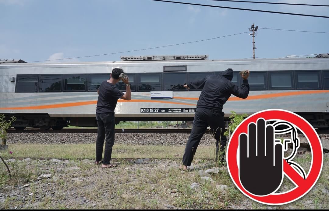 Ilustrasi pelemparan batu ke Kereta Api